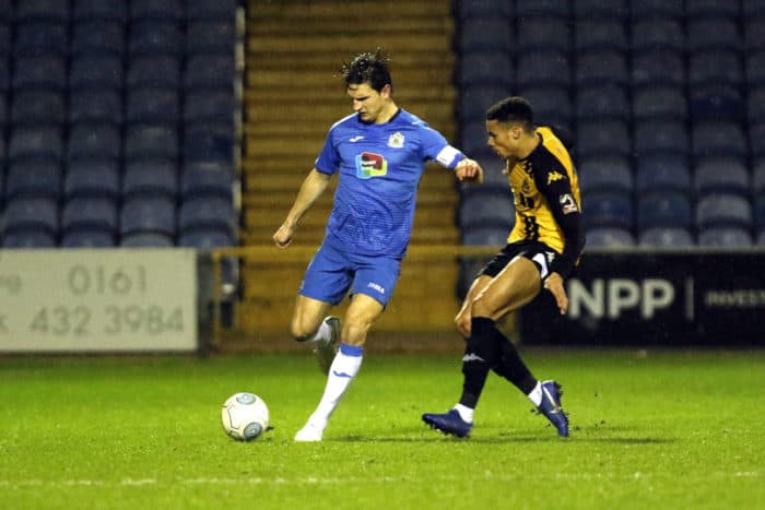 Ash Palmer on the ball for Stockport County