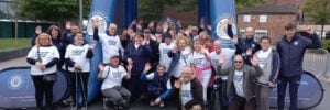 The Stockport County Move to a Mile Group celebrate completing the event